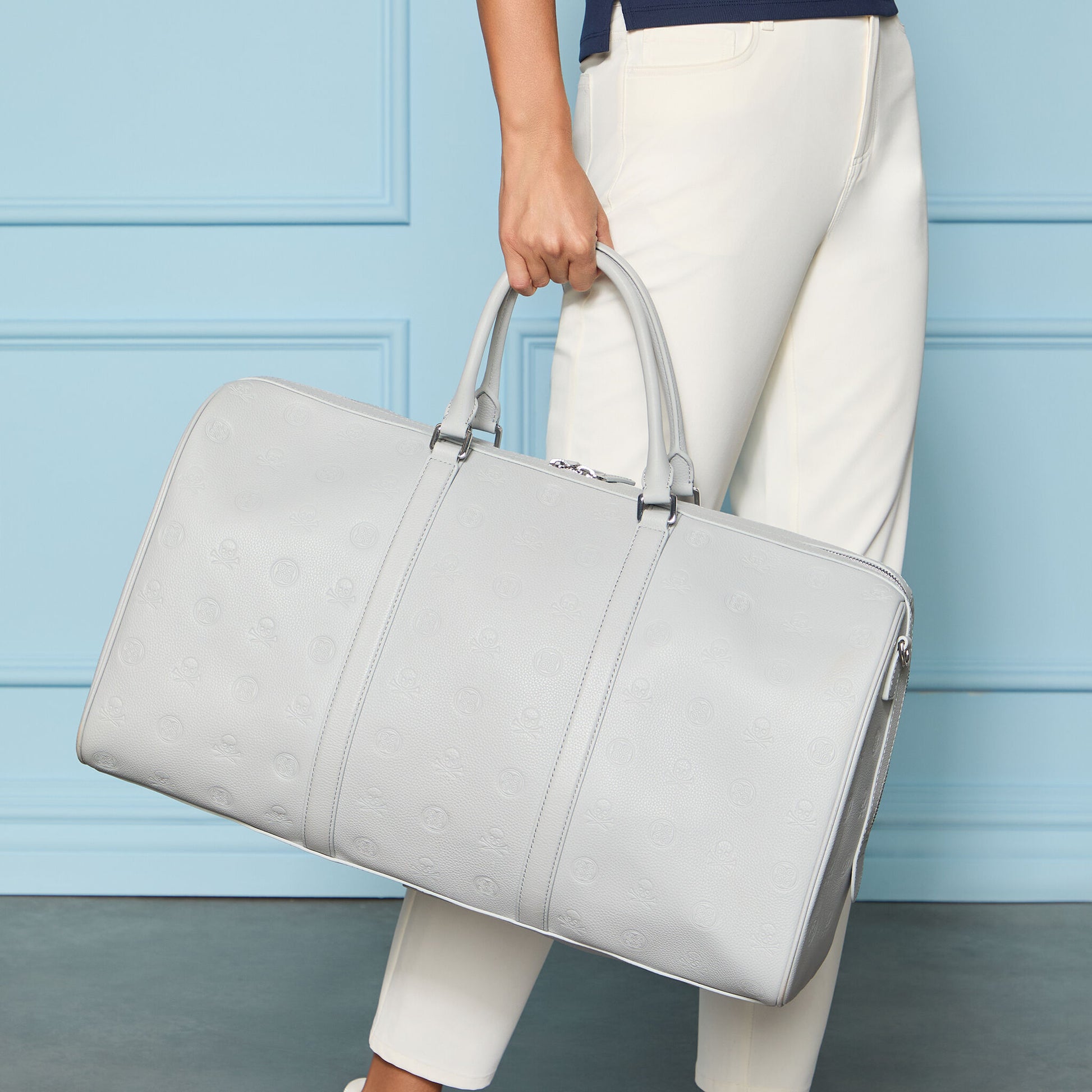 G/FORE - EMBOSSED SKULL & TEES LEATHER WEEKENDER