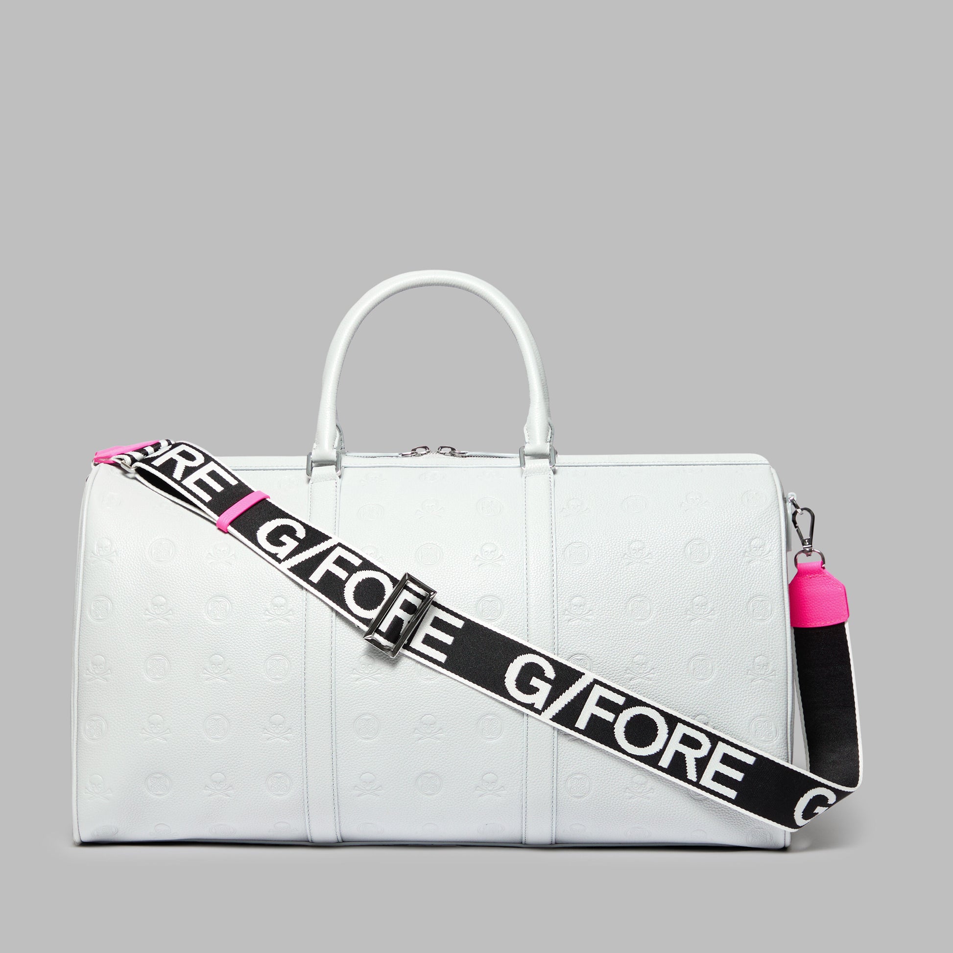 G/FORE - EMBOSSED SKULL & TEES LEATHER WEEKENDER