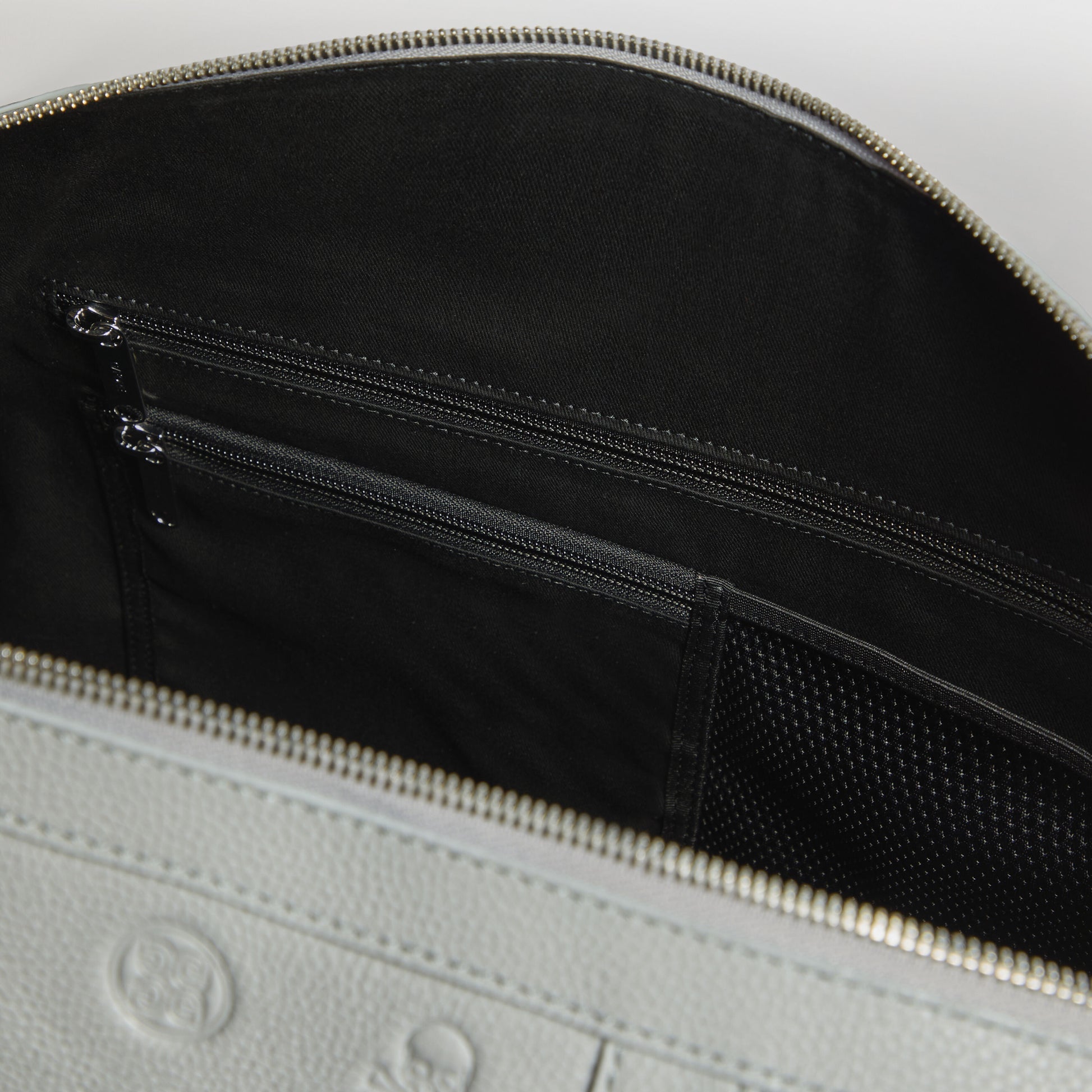 G/FORE - EMBOSSED SKULL & TEES LEATHER WEEKENDER